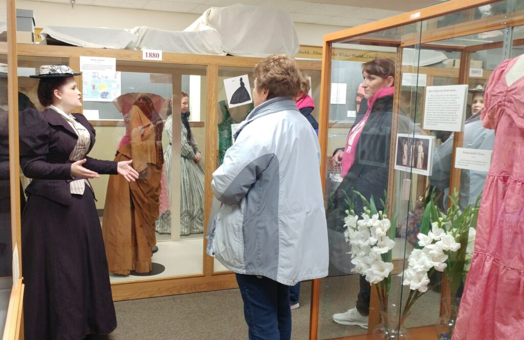 Women standing in a museum